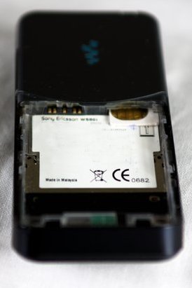 SIM card partially inserted